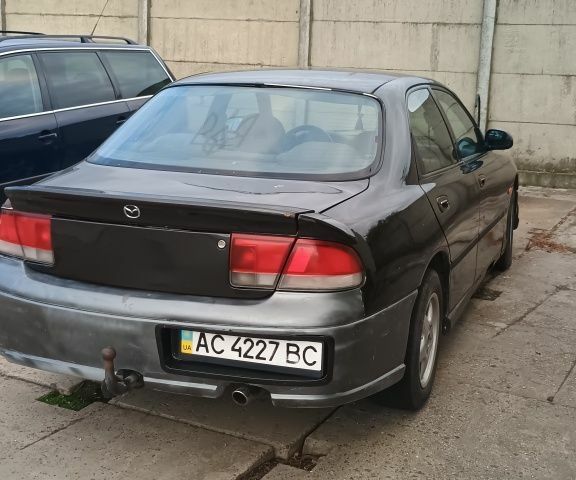 Серый Мазда 626, объемом двигателя 2 л и пробегом 312 тыс. км за 850 $, фото 6 на Automoto.ua