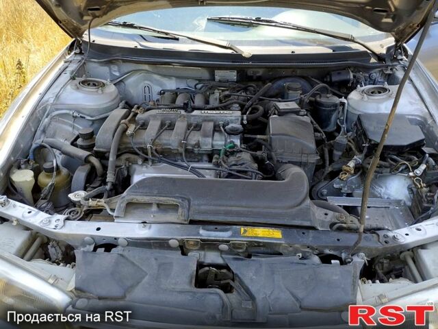 Серый Мазда 626, объемом двигателя 2 л и пробегом 297 тыс. км за 1600 $, фото 3 на Automoto.ua