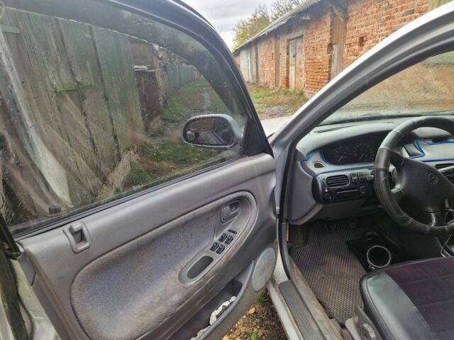 Серый Мазда 626, объемом двигателя 2 л и пробегом 422 тыс. км за 3000 $, фото 10 на Automoto.ua