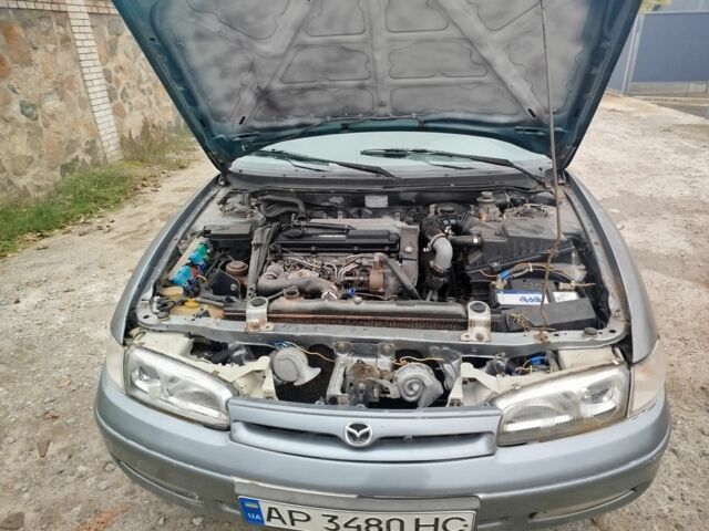 Серый Мазда 626, объемом двигателя 2 л и пробегом 100 тыс. км за 1000 $, фото 5 на Automoto.ua