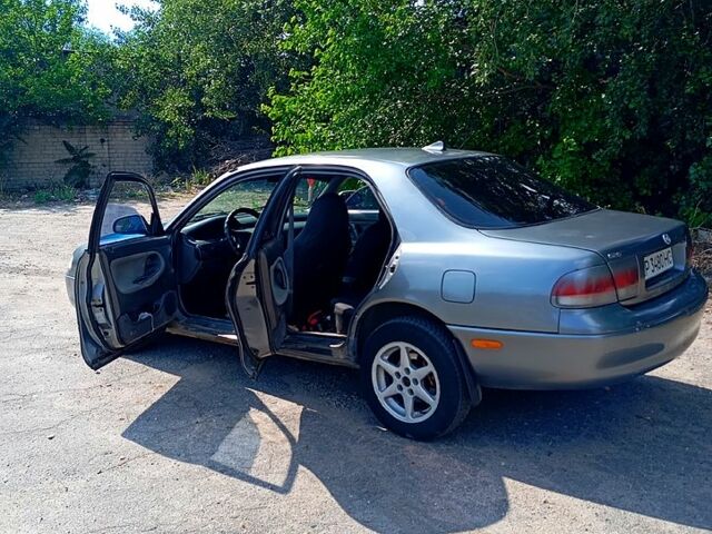 Сірий Мазда 626, об'ємом двигуна 2 л та пробігом 300 тис. км за 1700 $, фото 4 на Automoto.ua