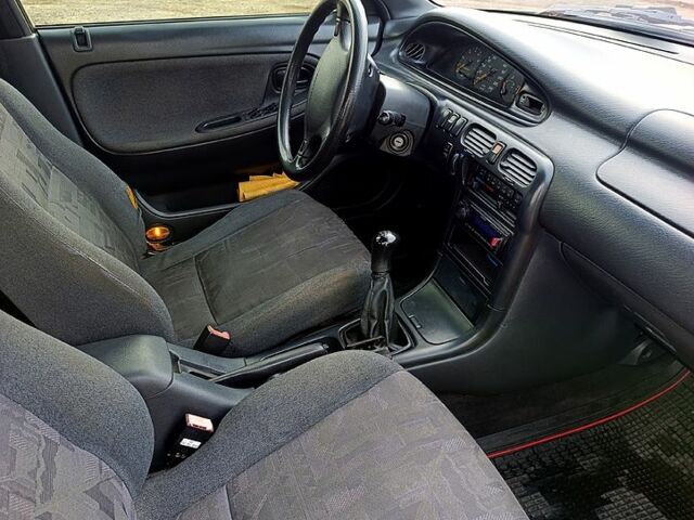 Серый Мазда 626, объемом двигателя 2 л и пробегом 250 тыс. км за 3000 $, фото 2 на Automoto.ua