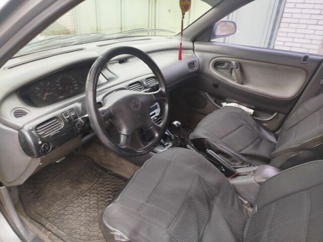 Серый Мазда 626, объемом двигателя 2 л и пробегом 100 тыс. км за 1000 $, фото 4 на Automoto.ua