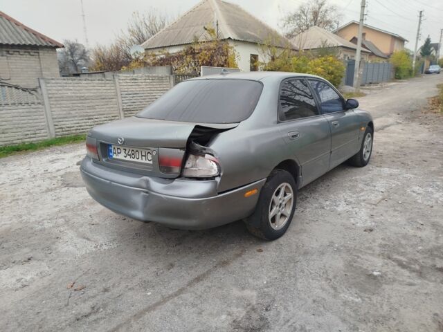 Серый Мазда 626, объемом двигателя 2 л и пробегом 100 тыс. км за 1000 $, фото 3 на Automoto.ua