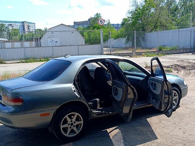 Сірий Мазда 626, об'ємом двигуна 2 л та пробігом 300 тис. км за 1700 $, фото 2 на Automoto.ua