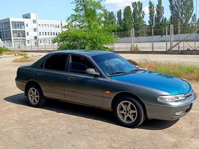 Сірий Мазда 626, об'ємом двигуна 2 л та пробігом 300 тис. км за 1700 $, фото 1 на Automoto.ua