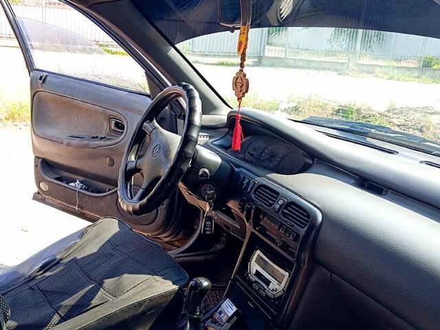 Сірий Мазда 626, об'ємом двигуна 2 л та пробігом 300 тис. км за 1700 $, фото 5 на Automoto.ua