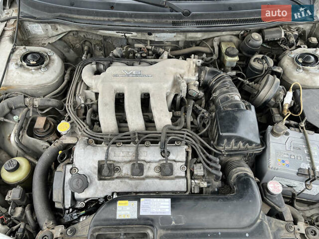 Серый Мазда 626, объемом двигателя 2.5 л и пробегом 300 тыс. км за 2200 $, фото 1 на Automoto.ua