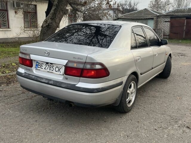 Серый Мазда 626, объемом двигателя 2 л и пробегом 290 тыс. км за 2900 $, фото 2 на Automoto.ua