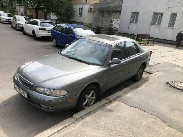 Серый Мазда 626, объемом двигателя 2 л и пробегом 350 тыс. км за 1200 $, фото 3 на Automoto.ua