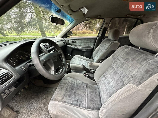 Серый Мазда 626, объемом двигателя 1.8 л и пробегом 340 тыс. км за 2200 $, фото 7 на Automoto.ua