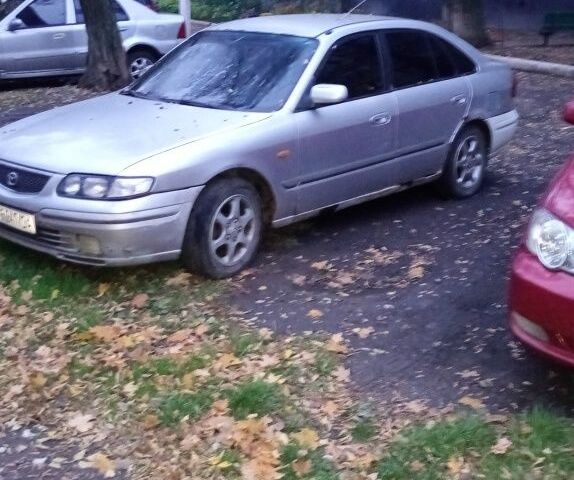 Серый Мазда 626, объемом двигателя 2 л и пробегом 2 тыс. км за 949 $, фото 1 на Automoto.ua