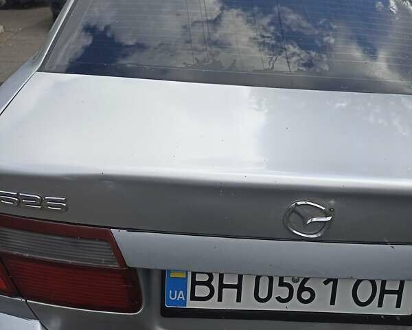 Серый Мазда 626, объемом двигателя 2 л и пробегом 320 тыс. км за 2630 $, фото 3 на Automoto.ua