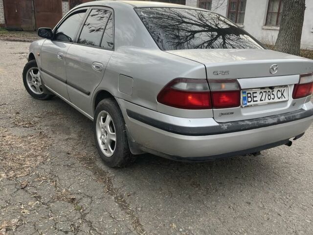 Серый Мазда 626, объемом двигателя 2 л и пробегом 290 тыс. км за 2900 $, фото 3 на Automoto.ua