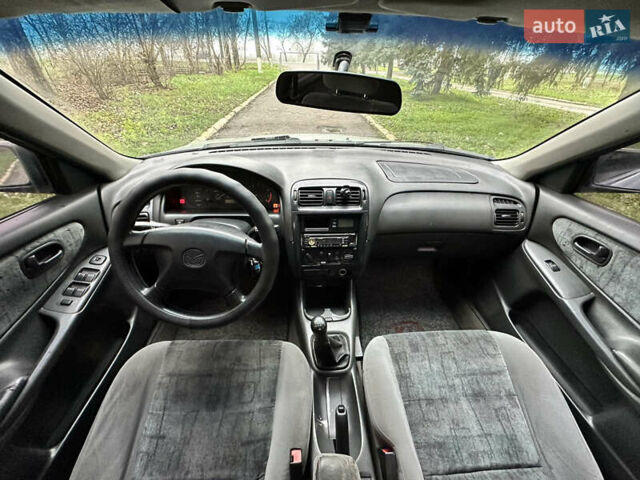 Серый Мазда 626, объемом двигателя 1.8 л и пробегом 340 тыс. км за 2200 $, фото 8 на Automoto.ua