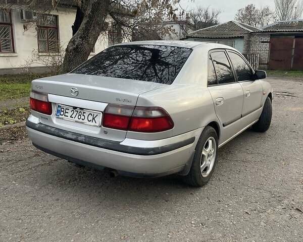 Серый Мазда 626, объемом двигателя 2 л и пробегом 290 тыс. км за 2900 $, фото 1 на Automoto.ua