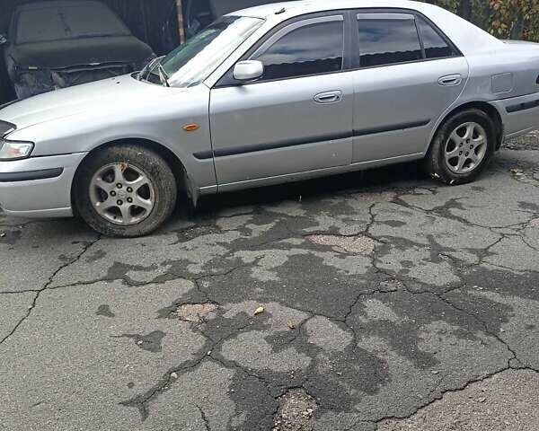 Серый Мазда 626, объемом двигателя 2 л и пробегом 320 тыс. км за 2630 $, фото 1 на Automoto.ua