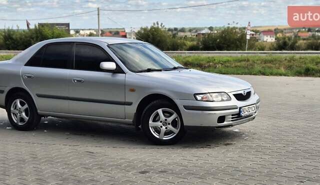 Серый Мазда 626, объемом двигателя 1.84 л и пробегом 286 тыс. км за 2800 $, фото 2 на Automoto.ua