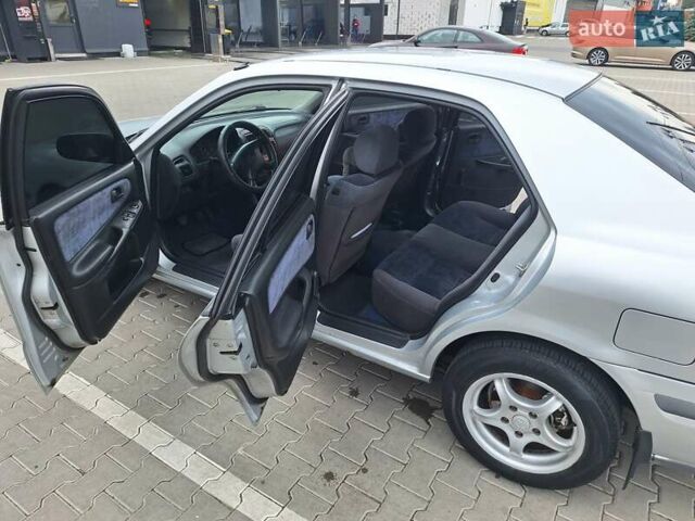 Серый Мазда 626, объемом двигателя 2 л и пробегом 319 тыс. км за 3200 $, фото 10 на Automoto.ua