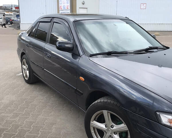 Сірий Мазда 626, об'ємом двигуна 2 л та пробігом 240 тис. км за 3650 $, фото 4 на Automoto.ua