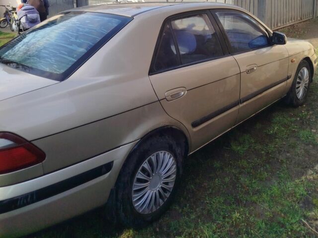 Серый Мазда 626, объемом двигателя 2 л и пробегом 2 тыс. км за 1500 $, фото 1 на Automoto.ua