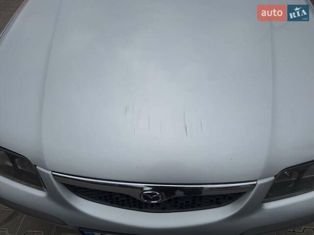 Серый Мазда 626, объемом двигателя 2 л и пробегом 319 тыс. км за 3200 $, фото 46 на Automoto.ua