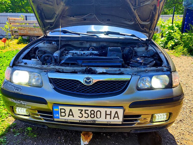 Сірий Мазда 626, об'ємом двигуна 2 л та пробігом 0 тис. км за 2000 $, фото 8 на Automoto.ua