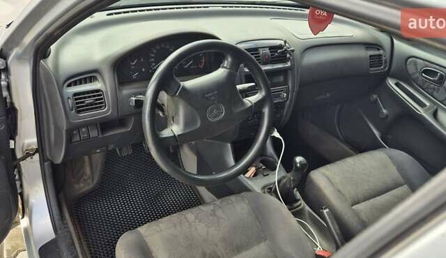 Серый Мазда 626, объемом двигателя 1.84 л и пробегом 286 тыс. км за 2800 $, фото 19 на Automoto.ua