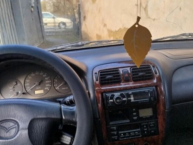 Серый Мазда 626, объемом двигателя 2 л и пробегом 2 тыс. км за 1500 $, фото 3 на Automoto.ua