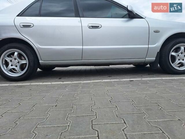 Серый Мазда 626, объемом двигателя 2 л и пробегом 319 тыс. км за 3200 $, фото 27 на Automoto.ua