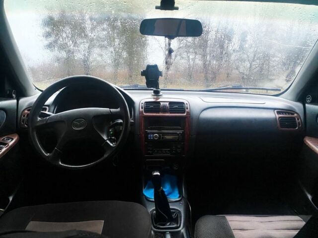 Сірий Мазда 626, об'ємом двигуна 2 л та пробігом 420 тис. км за 2500 $, фото 5 на Automoto.ua