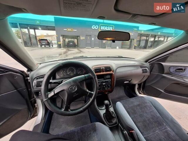 Серый Мазда 626, объемом двигателя 2 л и пробегом 319 тыс. км за 3200 $, фото 13 на Automoto.ua