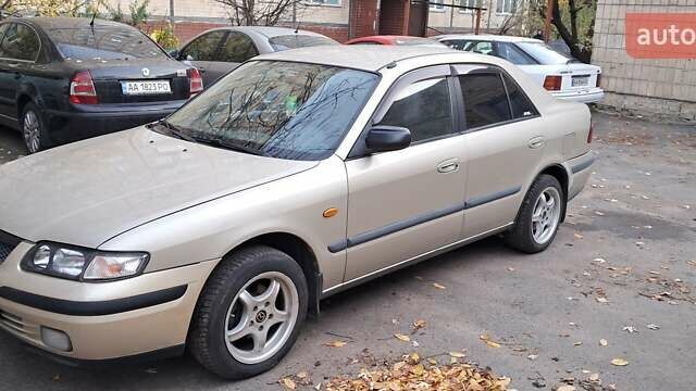 Серый Мазда 626, объемом двигателя 1.8 л и пробегом 320 тыс. км за 3300 $, фото 13 на Automoto.ua