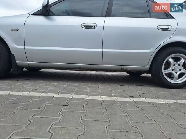 Серый Мазда 626, объемом двигателя 2 л и пробегом 319 тыс. км за 3200 $, фото 25 на Automoto.ua