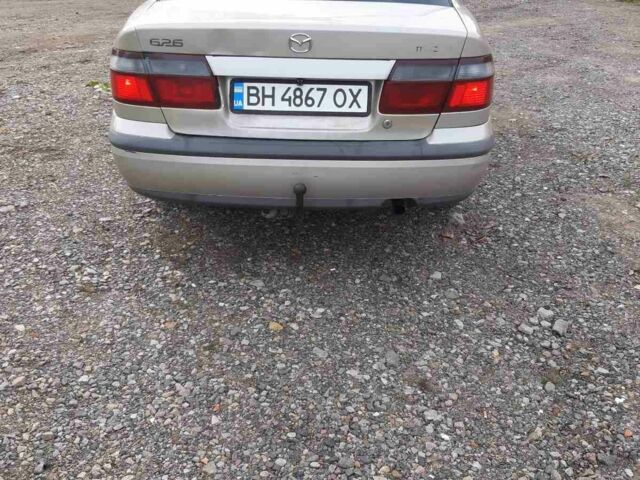 Серый Мазда 626, объемом двигателя 1.8 л и пробегом 225 тыс. км за 1200 $, фото 2 на Automoto.ua