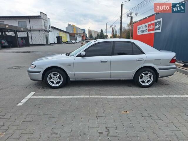 Серый Мазда 626, объемом двигателя 2 л и пробегом 319 тыс. км за 3200 $, фото 3 на Automoto.ua