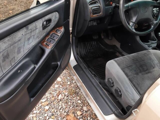 Серый Мазда 626, объемом двигателя 1.8 л и пробегом 225 тыс. км за 1200 $, фото 6 на Automoto.ua