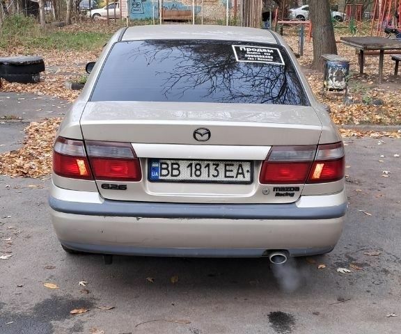 Серый Мазда 626, объемом двигателя 1.8 л и пробегом 325 тыс. км за 3219 $, фото 4 на Automoto.ua