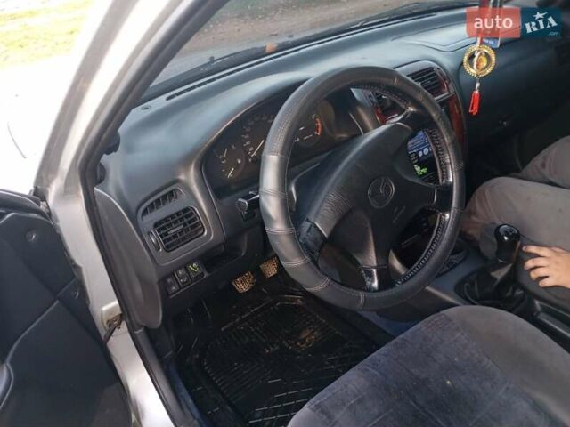 Серый Мазда 626, объемом двигателя 2 л и пробегом 380 тыс. км за 2950 $, фото 3 на Automoto.ua