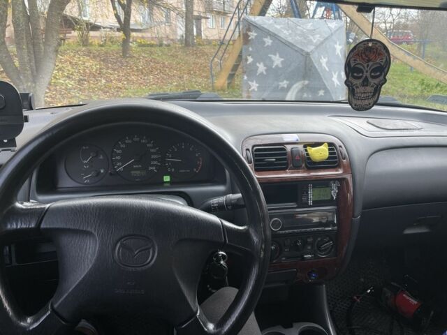 Сірий Мазда 626, об'ємом двигуна 2 л та пробігом 330 тис. км за 700 $, фото 5 на Automoto.ua