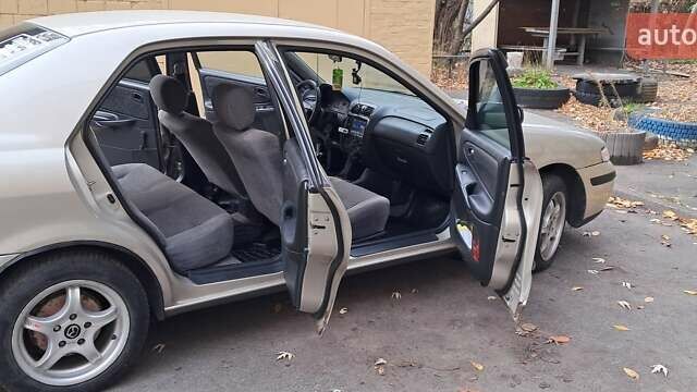 Серый Мазда 626, объемом двигателя 1.8 л и пробегом 320 тыс. км за 3300 $, фото 11 на Automoto.ua