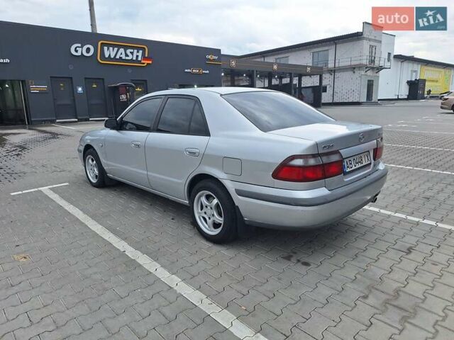 Серый Мазда 626, объемом двигателя 2 л и пробегом 319 тыс. км за 3200 $, фото 5 на Automoto.ua