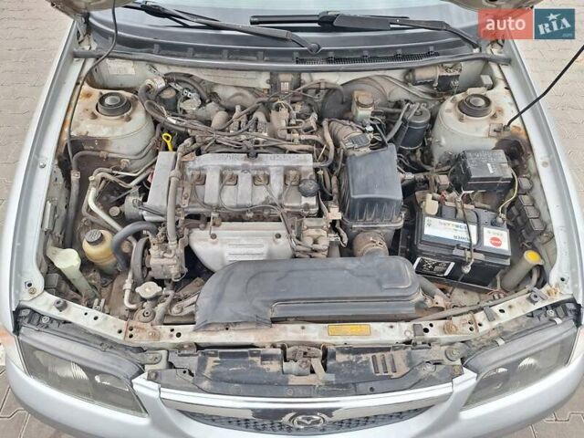 Серый Мазда 626, объемом двигателя 2 л и пробегом 319 тыс. км за 3200 $, фото 42 на Automoto.ua