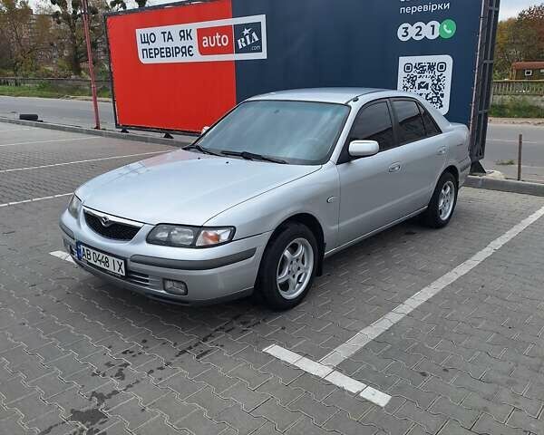 Серый Мазда 626, объемом двигателя 2 л и пробегом 319 тыс. км за 3200 $, фото 1 на Automoto.ua