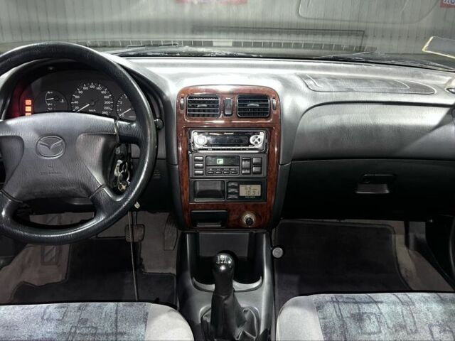 Серый Мазда 626, объемом двигателя 2 л и пробегом 105 тыс. км за 3800 $, фото 13 на Automoto.ua