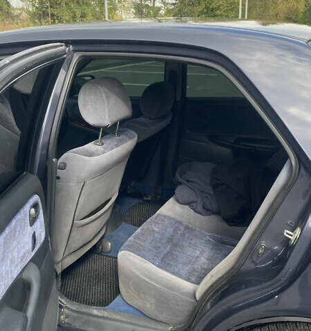Серый Мазда 626, объемом двигателя 2 л и пробегом 304 тыс. км за 3500 $, фото 6 на Automoto.ua