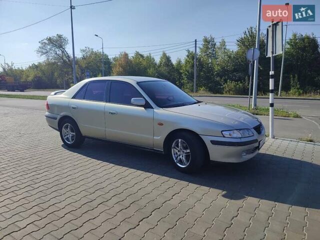 Серый Мазда 626, объемом двигателя 2 л и пробегом 350 тыс. км за 3300 $, фото 19 на Automoto.ua
