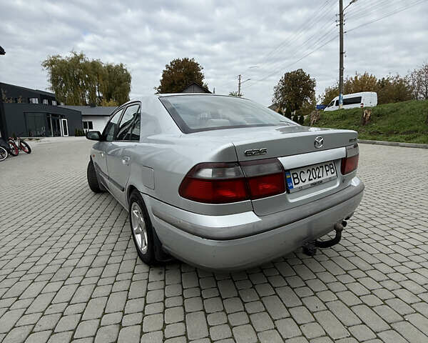 Сірий Мазда 626, об'ємом двигуна 1.8 л та пробігом 276 тис. км за 2000 $, фото 2 на Automoto.ua