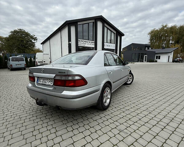 Сірий Мазда 626, об'ємом двигуна 1.8 л та пробігом 276 тис. км за 2000 $, фото 3 на Automoto.ua