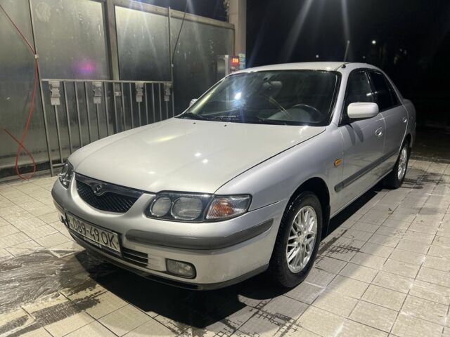 Серый Мазда 626, объемом двигателя 2 л и пробегом 105 тыс. км за 3800 $, фото 1 на Automoto.ua